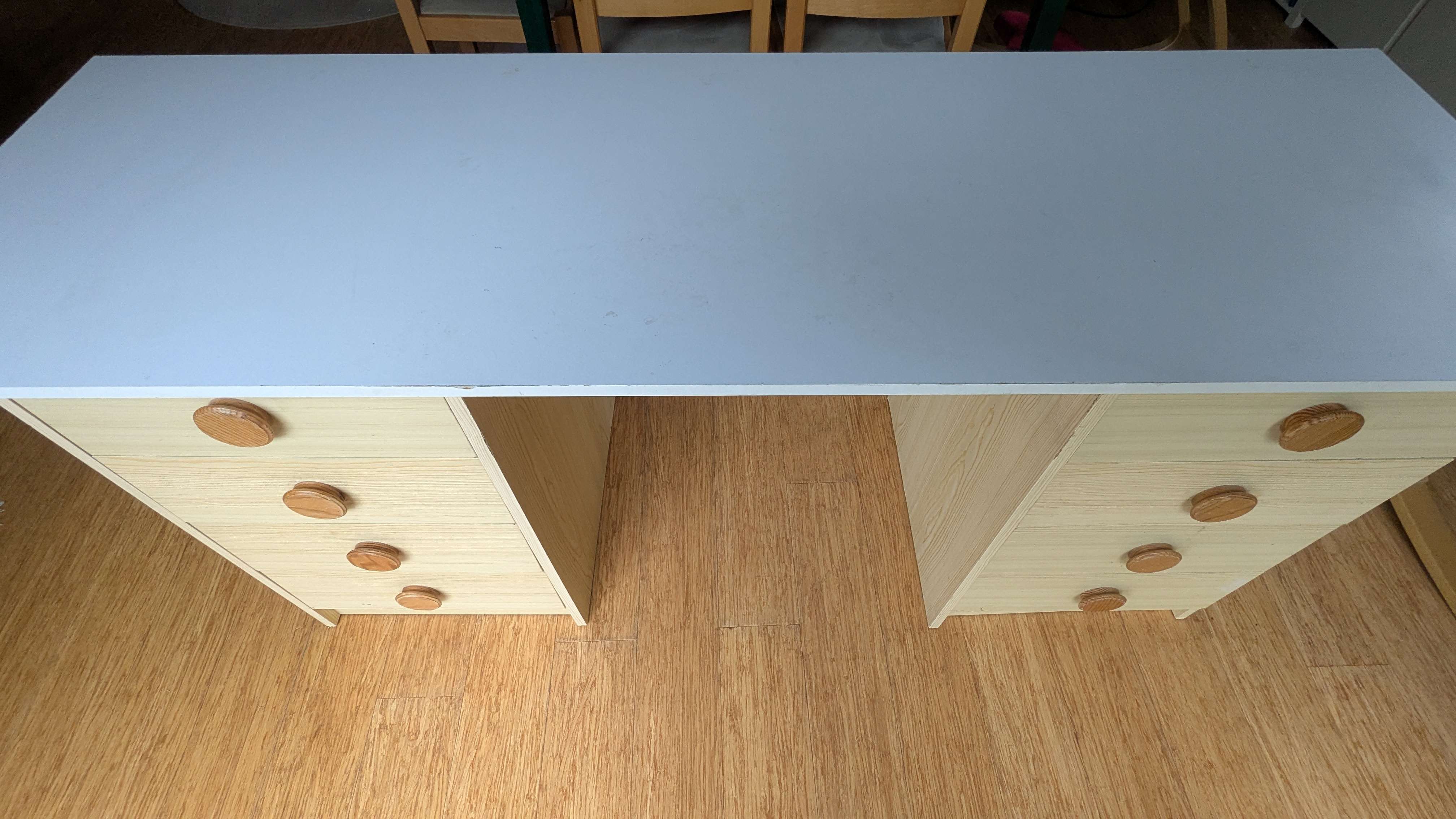 Two sets of drawers and board forming simple, flexible desk