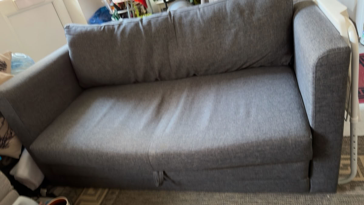 Grey two seater sofa bed