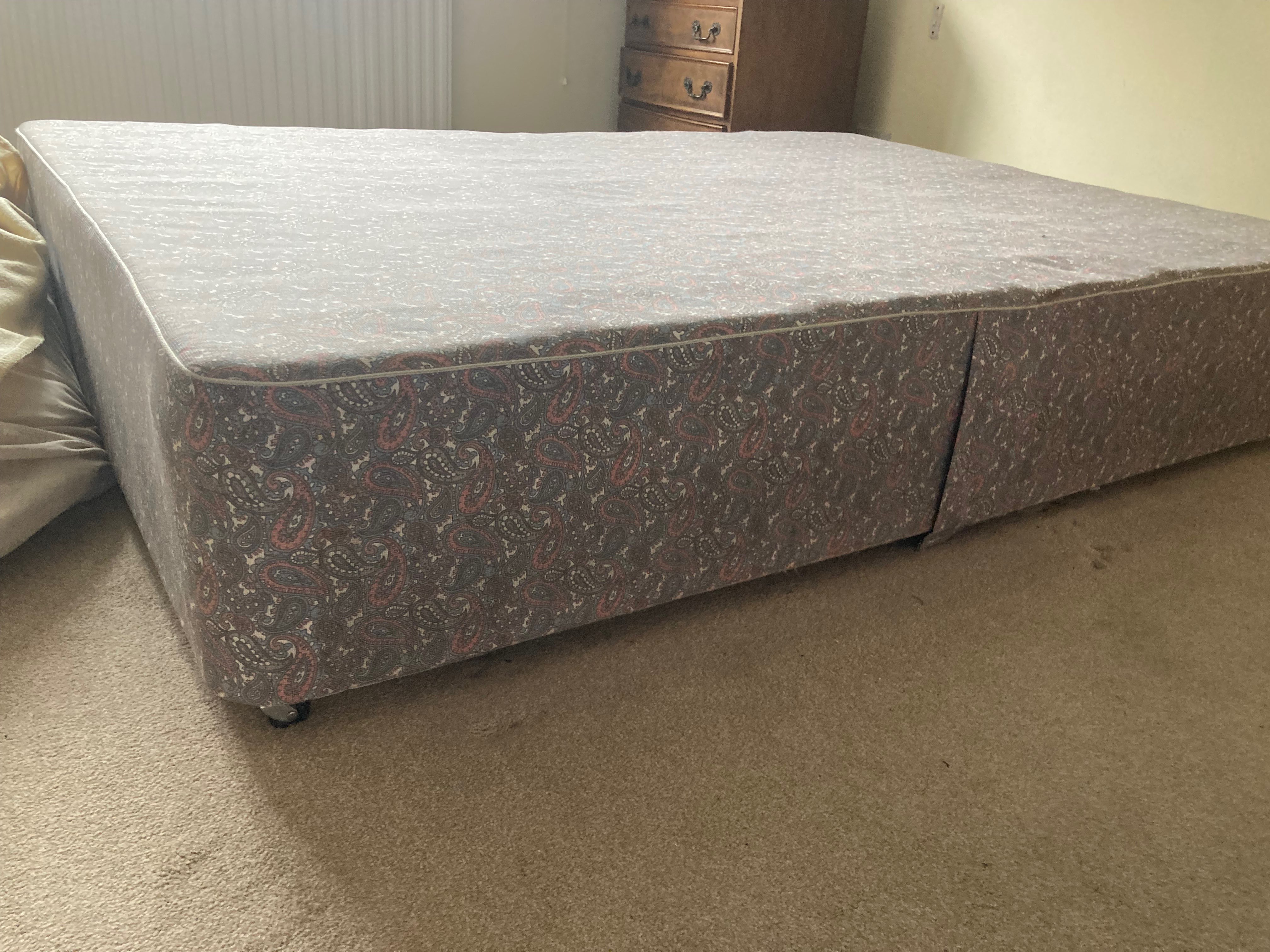Double divan base and mattress with fire resistant label on