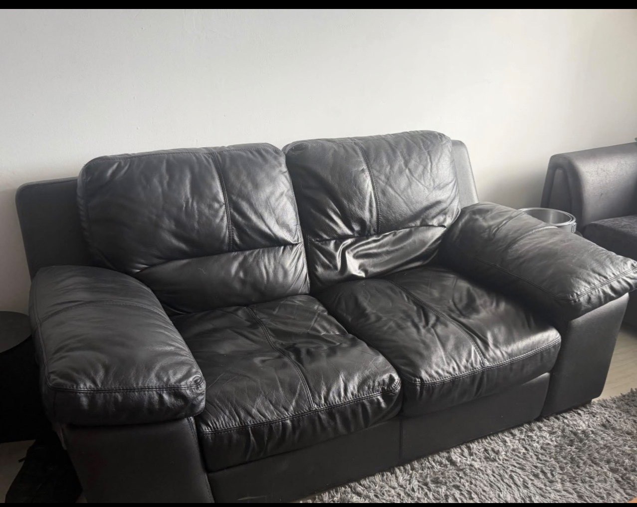 Brown leather two seats sofa