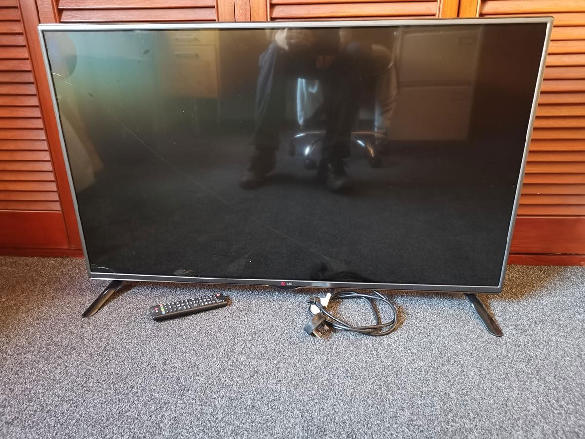LG TV with Remote and Power Cable