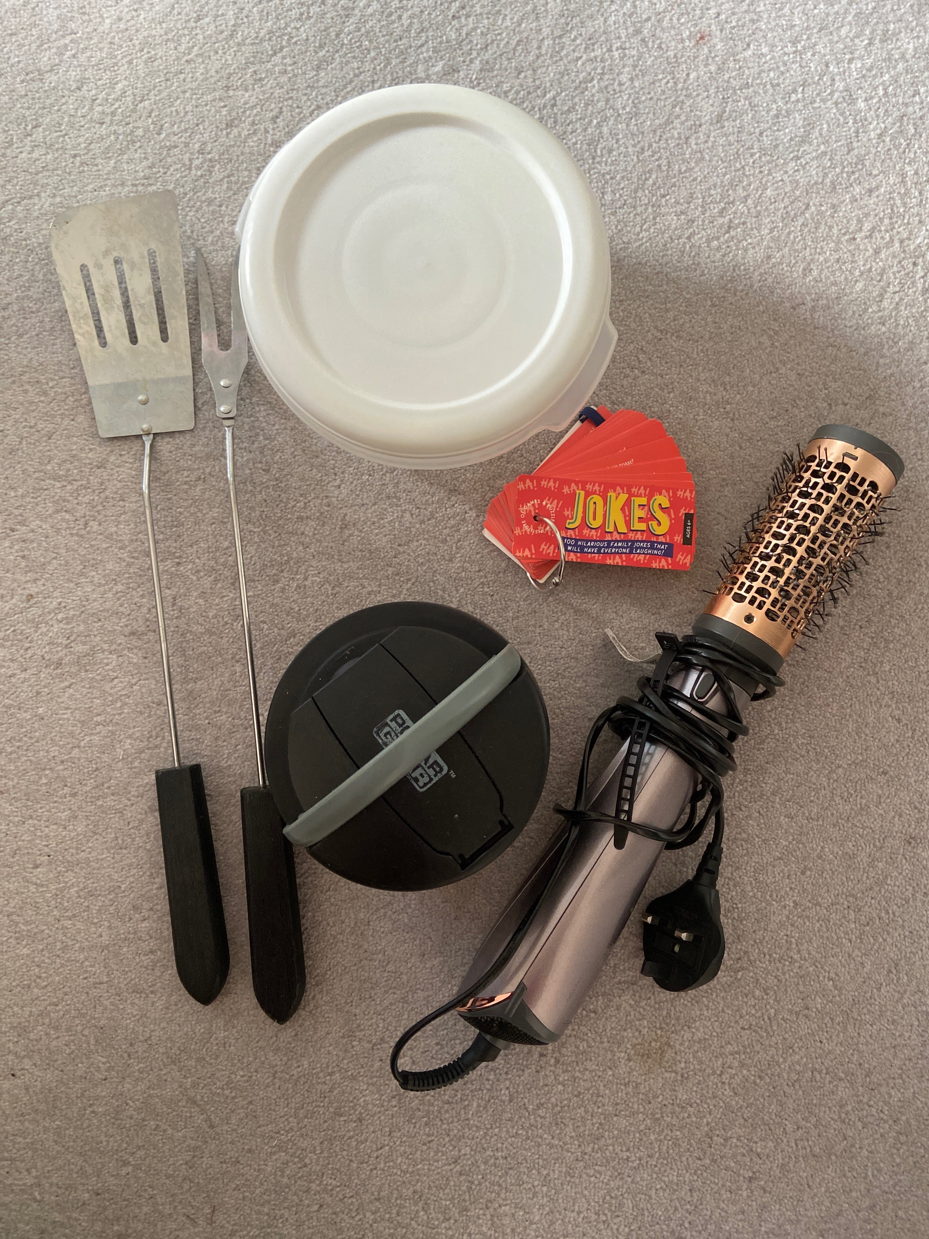 Hair styler. BBQ utensils. Jokes. Food containers.